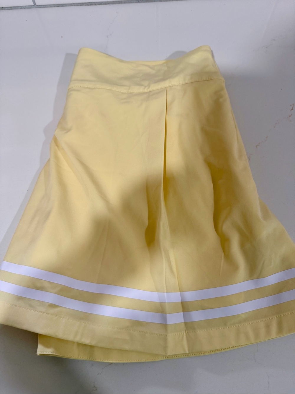 CALIA by Carrie Underwood Pale Yellow Skort with White Hem Stripes